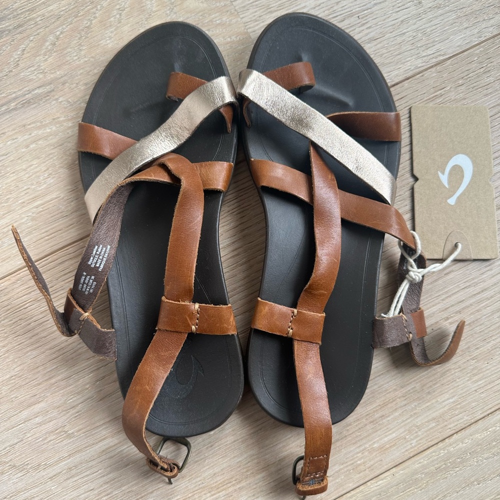 OluKai Brown and Gold Strappy Sandals